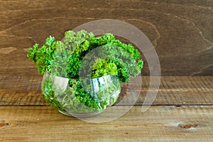 Parsley bunch in a glass bowl