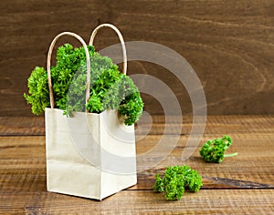 Parsley bunch in a paper package