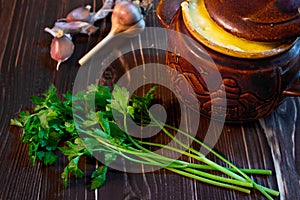 Parsley and a pot of meat