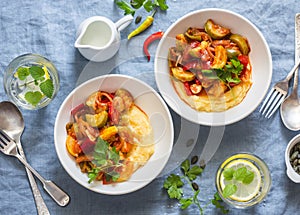 Parsnip root mashed puree and vegetable ratatouille - delicious vegetarian healthy food lunch on blue background, top view.