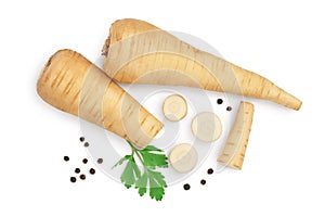 Parsnip root and slices with parsley peppercorns isolated on white background with clipping path. Top view. Flat lay