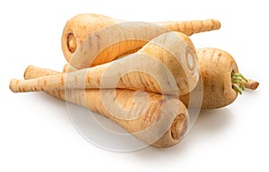 Parsnip roots with green leaf isolated on white background. File contains clipping path