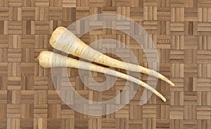 Parsnips on a wood cutting board