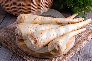 Parsnips on a wooden cutting board