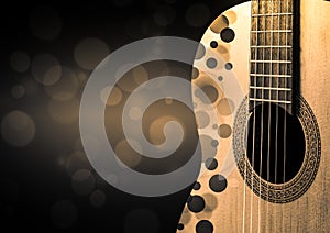 Part of an Acoustic guitar with a shadow on a gray background