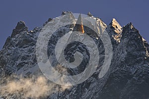 Part from Aiguilles mountain range peaks and blue sky. Chamonix, France photo