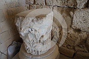Part of the antique column with relief is located on the territory of the Acropolis of Lindos.