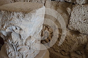 Part of the antique column with relief is located on the territory of the Acropolis of Lindos.