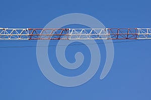 Part of arm machinery construction crane with blue sky background
