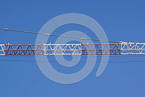 Part of arm machinery construction crane with blue sky background