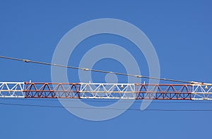 Part of arm machinery construction crane with blue sky background