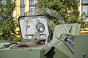 Part of an armoured military vehicle on the street