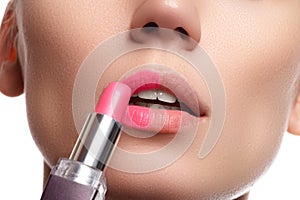 Part of attractive asian woman`s face with fashion lips make-up