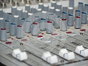 Part of an audio sound mixer with buttons