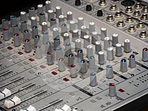 Part of an audio sound mixer with buttons