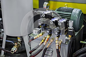 Part of automatic injection molding machine and plastic hoses at exhibition