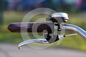 Part of a Bicycle or handlebar, grips. eco-friendly vehicle, sporty city and people