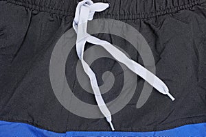 Part of black blue fabric sweatpants