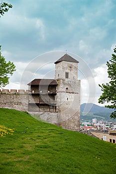 The part of castle's wall with turret clock in Trencin