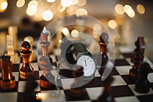 Part of chess table. chess pieces on a wooden chess board, top view. Leisure relax time or business strategy concept. Flat lay