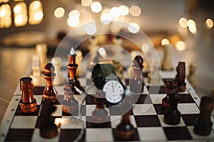 Part of chess table. chess pieces on a wooden chess board, top view. Leisure relax time or business strategy concept. Flat lay