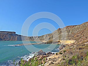 Gnejna bay coastal region in malta photo