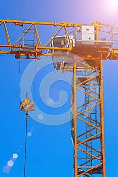 Part construction crane with blue sky background