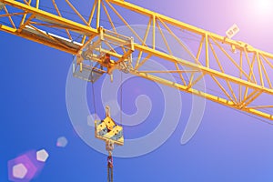 Part construction crane with blue sky background