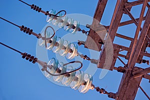 Part of Electricity transmission power line - High voltage tower - with glass insulators