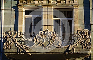 The part of facade of old residential building on pedastrian street of Samara city