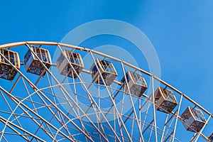 Part of a ferris wheel in the sky