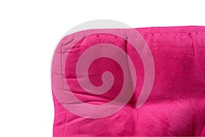 Part of fluffy pink pillow isolated on white background