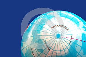 Part of a globe showing the Antarctica and the South Pole