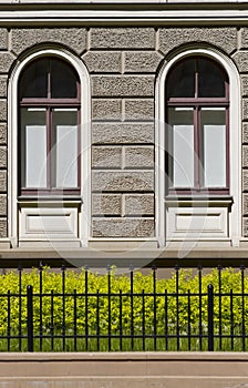 Part of house with two similar windows