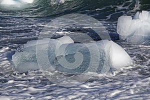 Part of an iceberg washed on shore.
