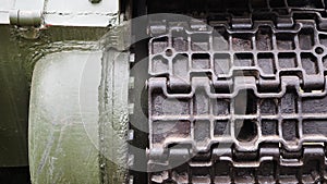 Part of the iron tracked wheels of the tank close-up