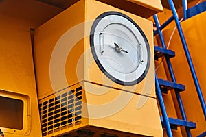 Part of a large quarry dump truck. The air filter of the BELAZ dump truck which is confused with the lighting headlight