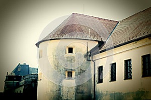 Part of medieval Cerveny Kamen Red Stone Castle near Casta village, Slovakia. Vintage filter