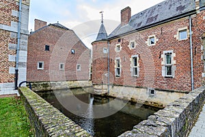 Part of moat surrounding 16th century Alden Biesen castle, seen from bridge