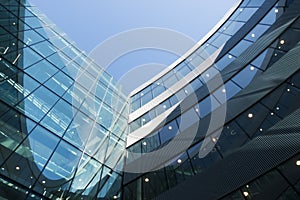 A part of modern business building against blue sky