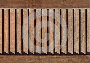 Part of modern interior with brown horizontal pattern texture of wooden shutters, casements or blinds background