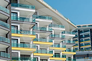 Part of a modern residential flat exterior of an apartment building. Detail of a new luxury home and residential complex