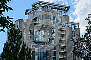 Part of a multi-storey house against the sky