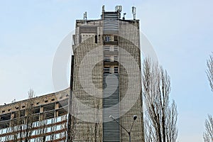 Part of old brick high house against the sky