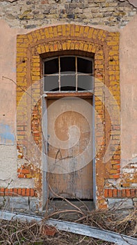 Part of the old building with door.