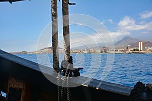 Part of an old sailing ship facing the coast