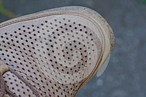 Part of old single brown leather boot