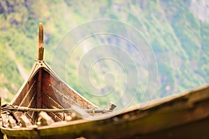 Part of old wooden viking boat in norwegian nature