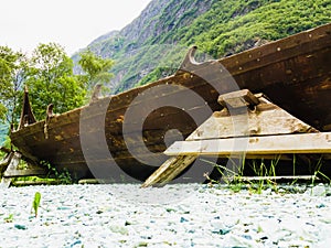 Part of old wooden viking boat in norwegian nature