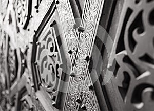 Part of the ornaments of the bronze-plate door of Sultan Qalawun mosque, al Moez street, Cairo, Egypt photo